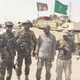 PMF militants pose with an American M1 tank shortly after they captured the tank from ISIS. The fighter on the right is holding an American made AT-4 recoilless anti-tank weapon.